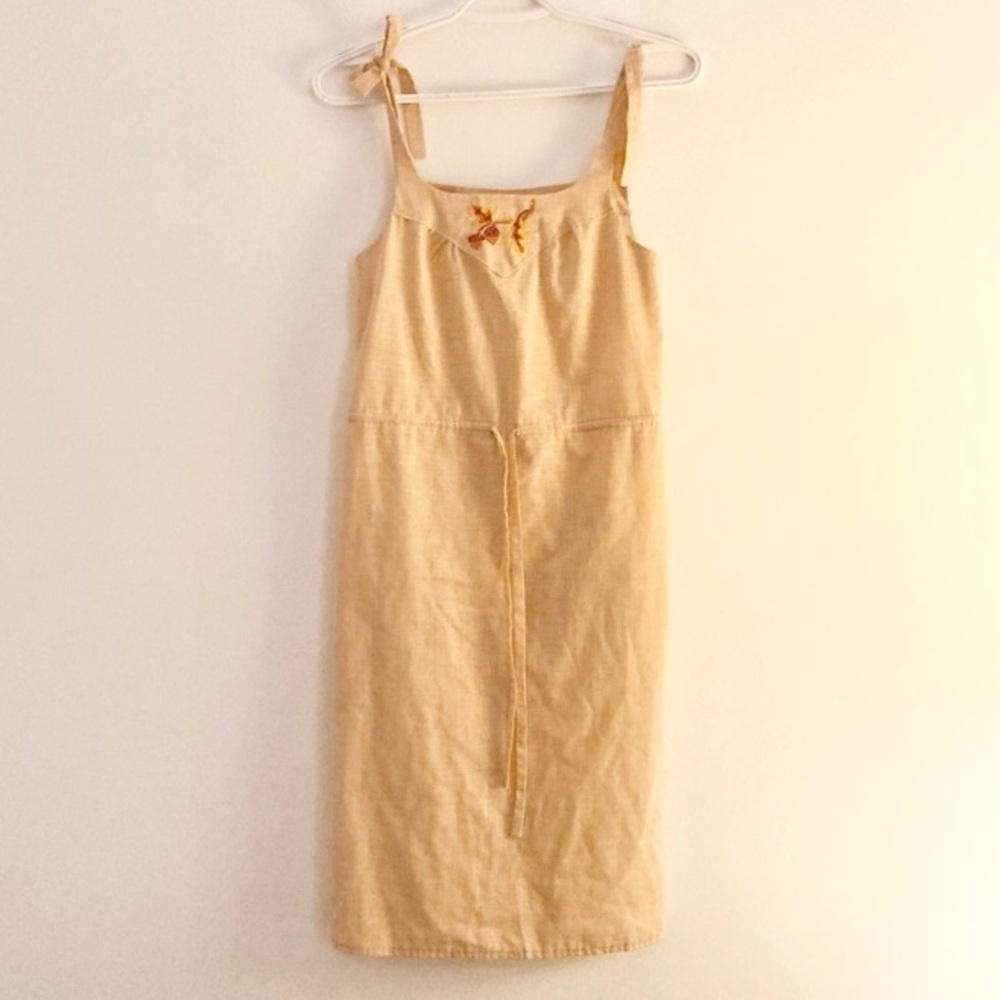 Vintage dress with tie sleeves pockets and embroidered detailing